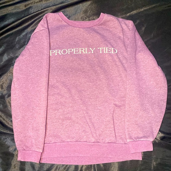 The brand is properly tied it is a small but it would fit a grown woman - Picture 1 of 3